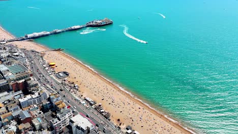 soaring above brighton. its bustling beach, popular seafront amusements, water sports and sparkling waters teeming with summer fun.