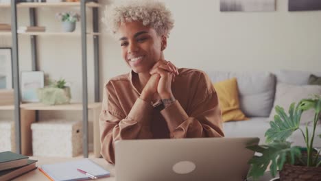 happy millennial african business woman use computer visualize career success