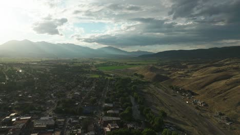 aerial cinematic drone sunset afternoon summer downtown salida lime mill colorado near buena vista arkansas river riverside park scout surfing wave biking hiking rafting rocky mountain down jib motion