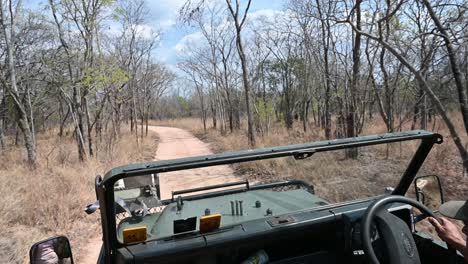 game drive through matobo national park with a guide driving and old range rover in zimbabwe, africa