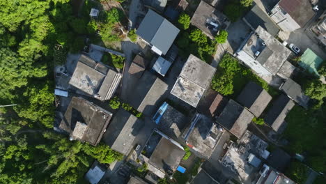 birds eye aerial view over houses in xingping ancient town, summer day in china