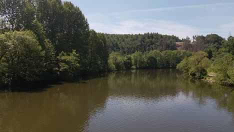 Calm-expansive-river-in-west-Germany-on-a-sunny-spring-morning