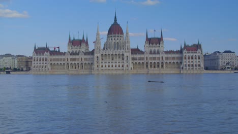 budapest parliament view from batthyány square during the danube flood. fast motion