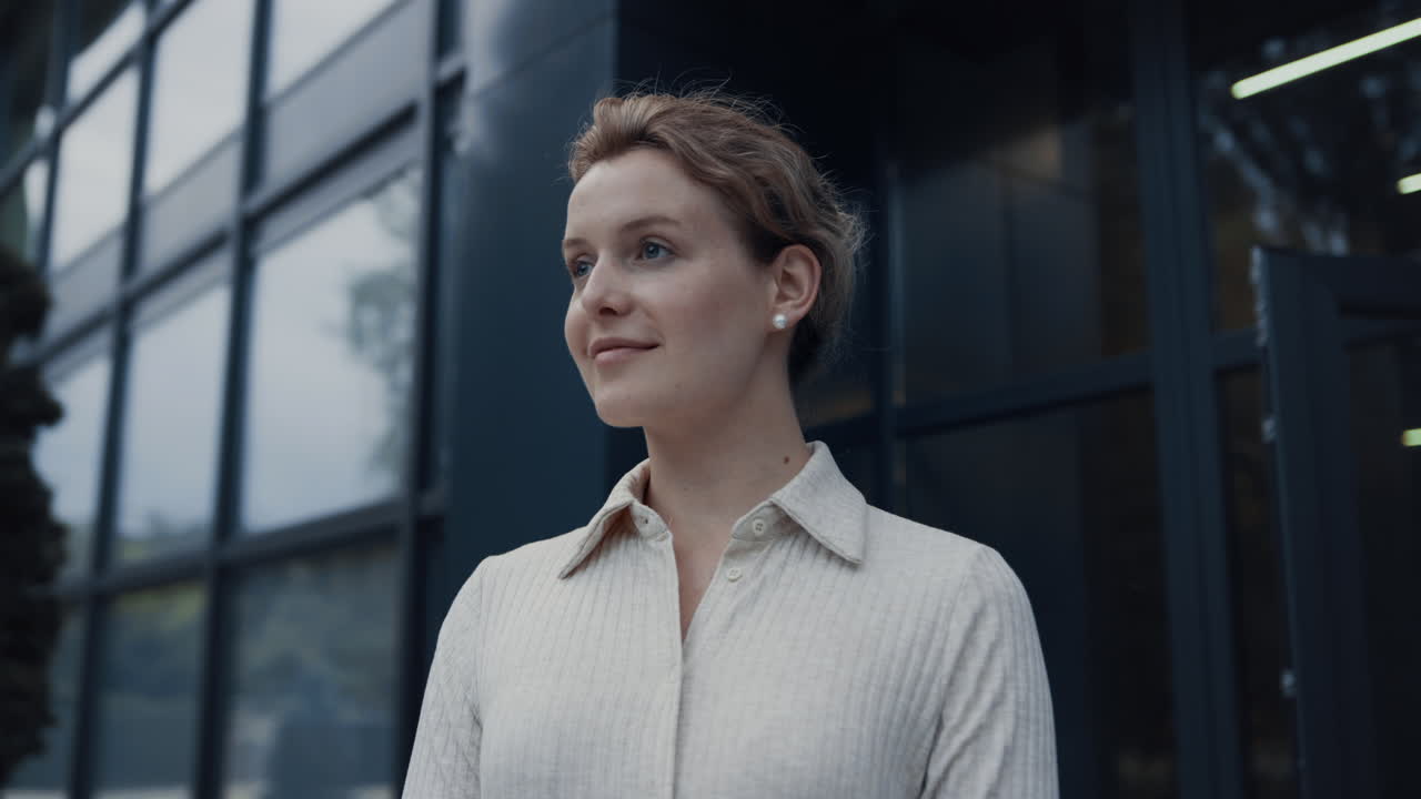 Smiling woman teacher look in distance closeup. Young school worker posing alone