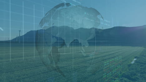 digital 3d globe rotating over green farmland, showcasing wind turbine icons and data charts