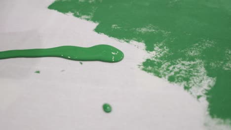 green pouring paint