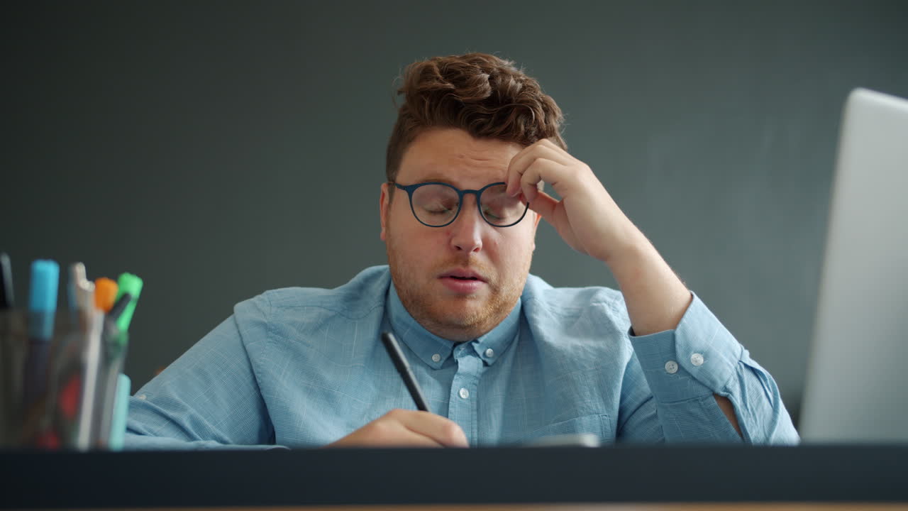 Tired Designer Working on a Project