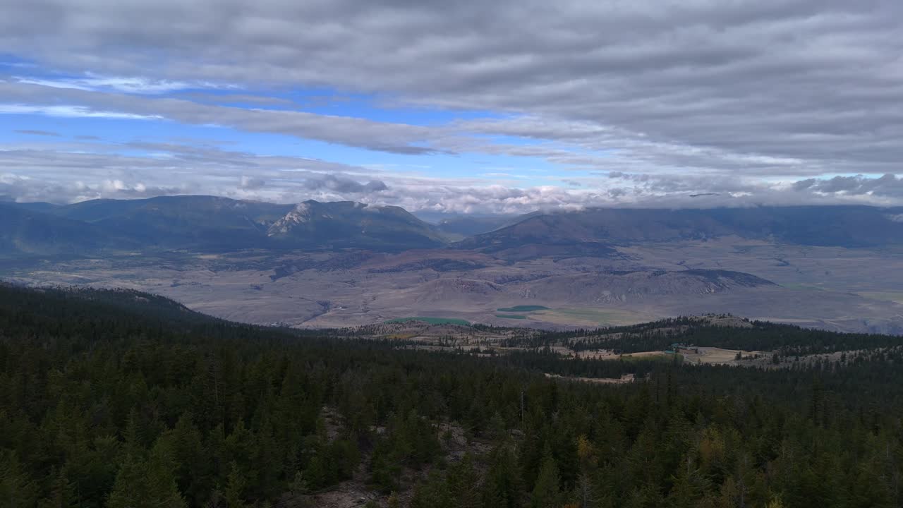 Ashcroft, British Columbia's Natural Setting from Above: Untouched Forests and Semi-Arid Desert under Cloudy Skies