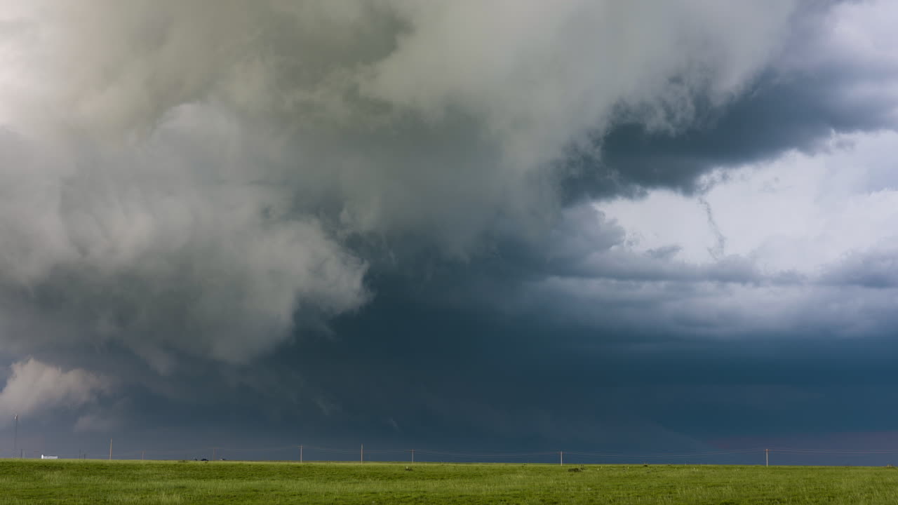 Stunning Storm Clouds Full Of Contrast And Texture Rise Above Green Fields