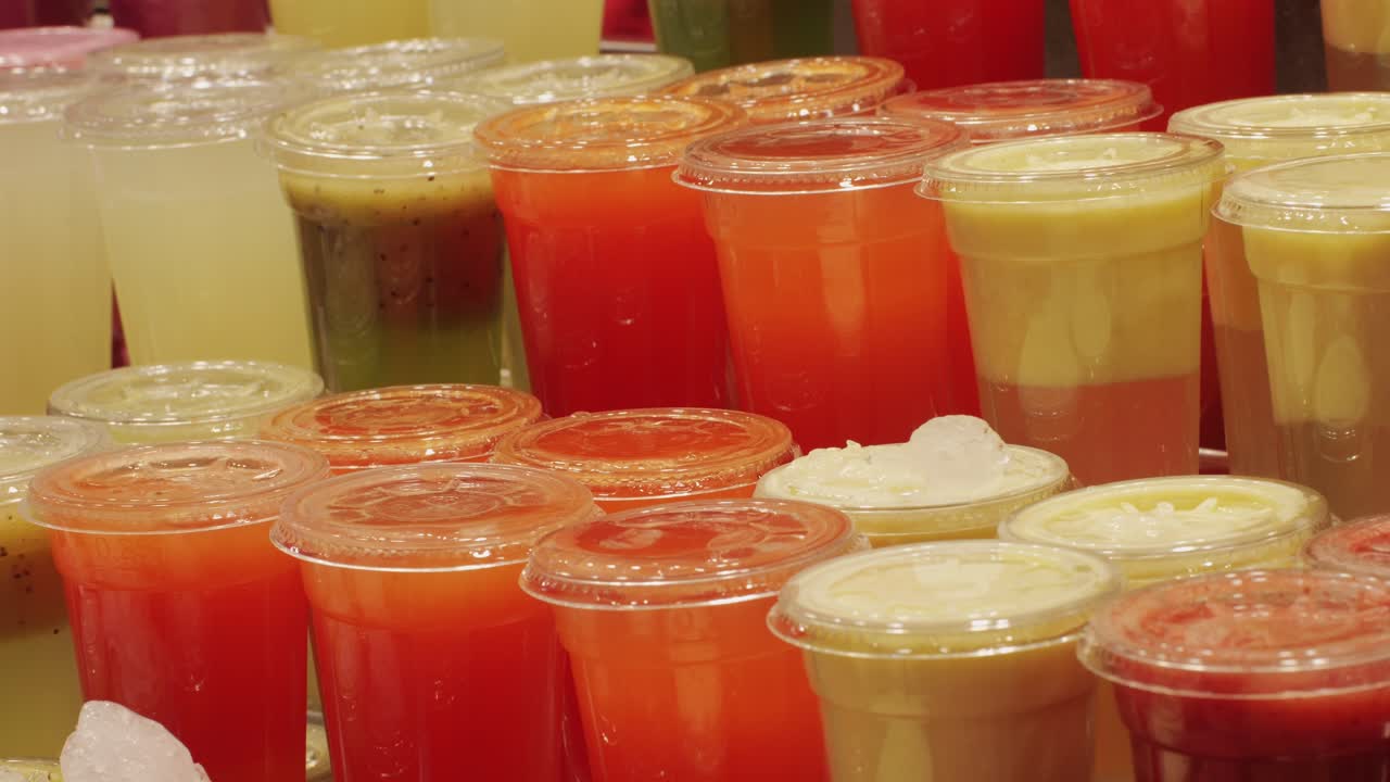 Fresh Natural Fruit Juice For Sale In Spanish Market. High quality 4k footage