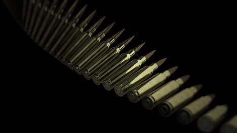 closeup of rifle bullets animation on black background.