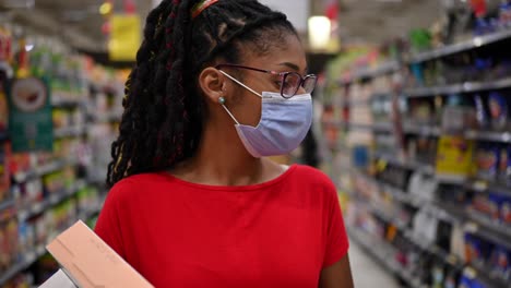 Latin-young-woman-wearing-a-face-mask-shopping-make-up