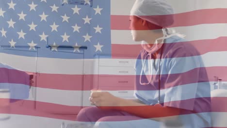 Animation-of-USA-flag-with-healthcare-worker-in-background-during-coronavirus-pandemic
