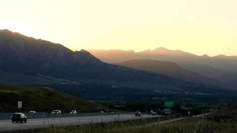 car driving toward boulder, colorado on us36 highway in slow motion