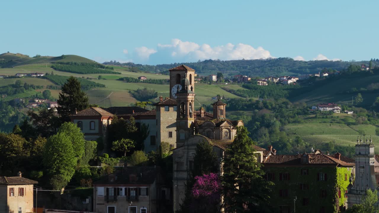 Historic village of Neive with castle, surrounded by Langhe vineyards. Piedmont region, wine country, Italy