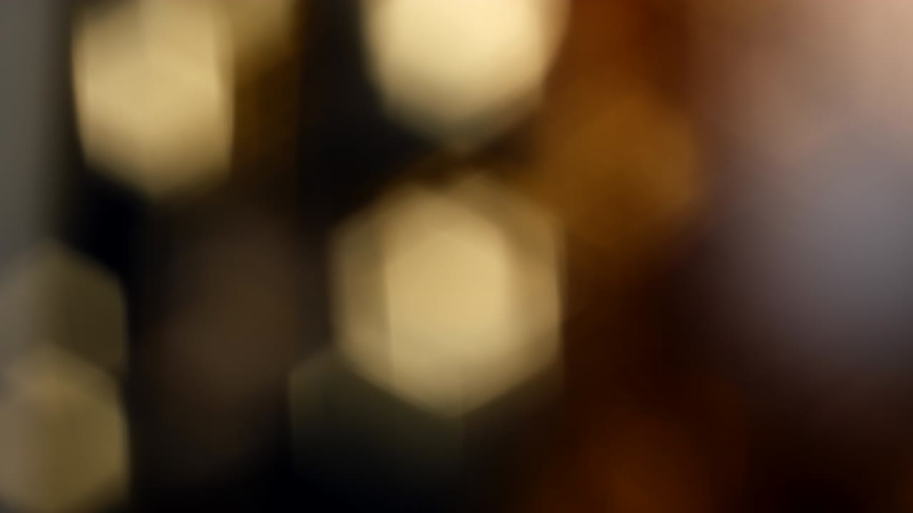 Abstract light leaks on black background.