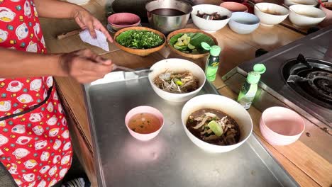 sequence of serving traditional noodle soup dishes