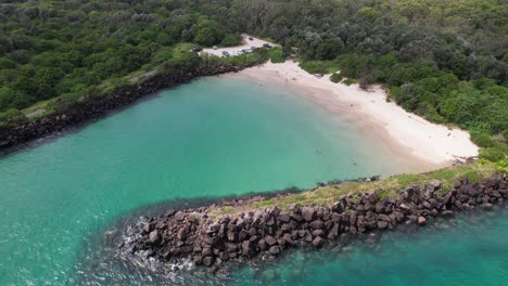 marlo’s beach at tweed river in fingal head, nsw, australia - aerial shot
