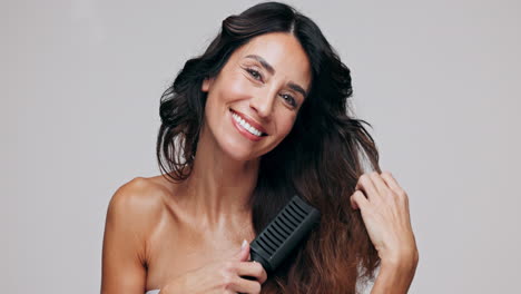 woman brushing her hair