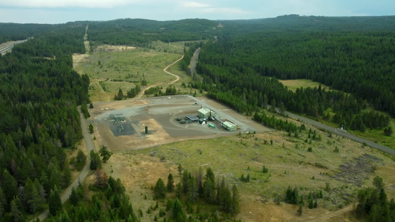 US, Oregon, Meacham, 2025-08-03 - Drone view of a Natural Gas Compressor Station in the forest in the mountains