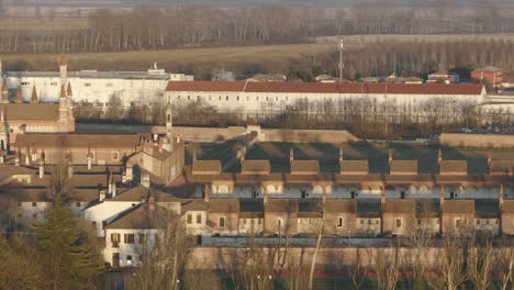 Aerial-view-over-Certosa-di-Pavia-monastery-shot-at-60-fps