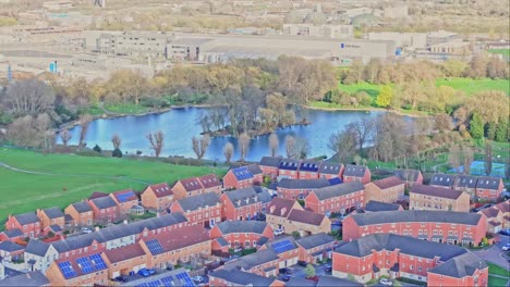 The-industrial-district-of-Derby-lit-by-the-Sun-is-neighbouring-with-a-strip-of-green-lawns-and-trees-starting-to-bloom