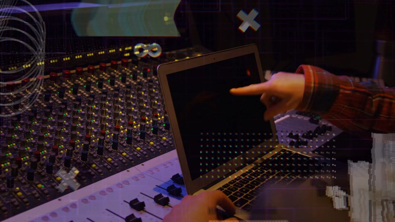 Hand moving to laptop causing two pros mixing audio at desk and pointing, glitch overlaying hands