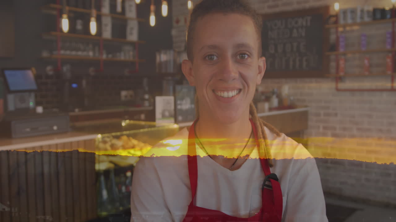 animación del paisaje sobre el hombre sonriente que trabaja en el café.