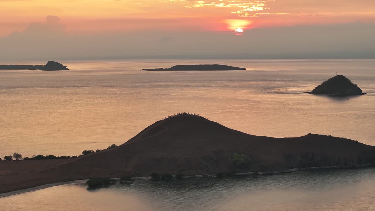 Sunset over Gili Kenawa Island, West Nusa Tenggara, Indonesia. Tourist travel destination. Drone