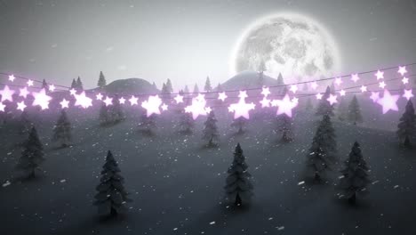 Glowing-star-shaped-fairy-lights-decoration-against-snow-falling-over-winter-landscape