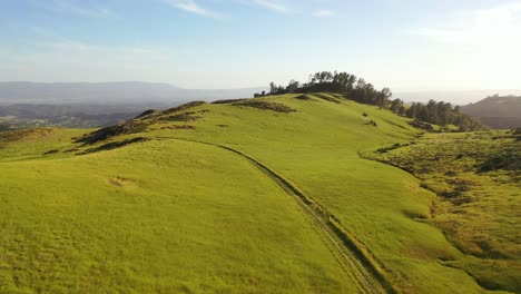 beautiful aerial over grassland and remote hills and mountains reveals santa ynez valley santa barbara