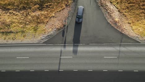 Drone-shot-of-crossroads-on-highway-in-Iceland-during-winter