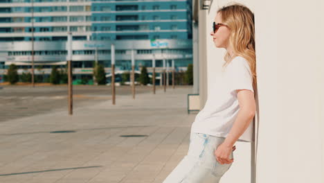 woman in city, enjoying a sunny day