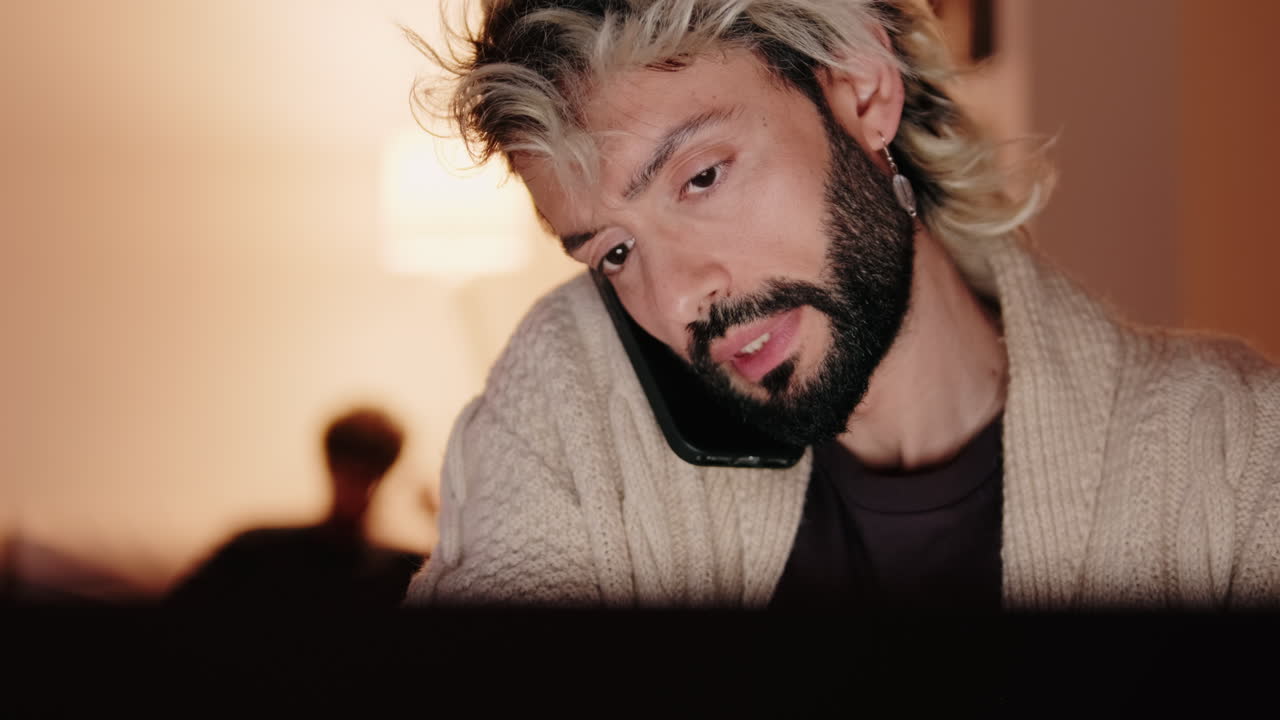 Gay Couple Working From Home at Night