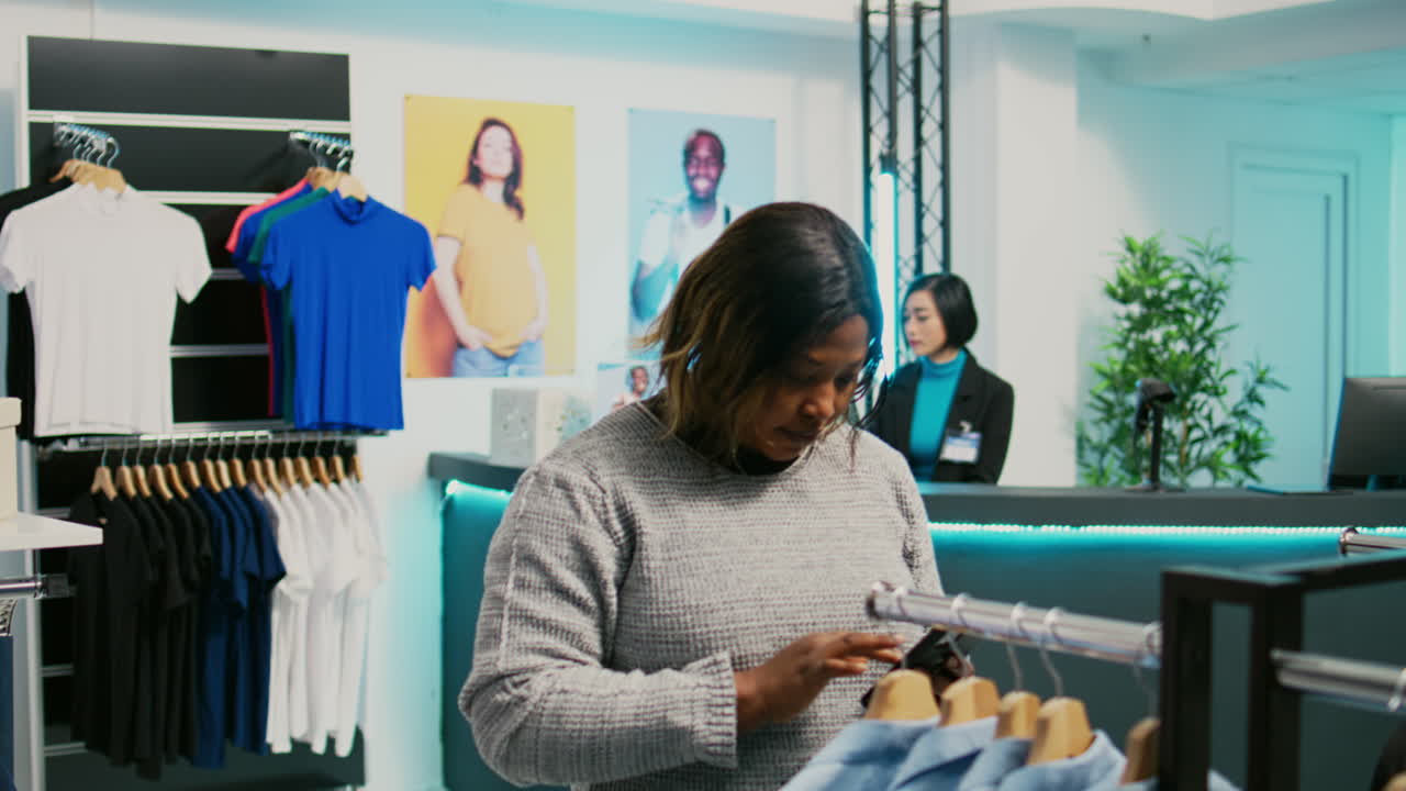 People shopping for clothes in a store