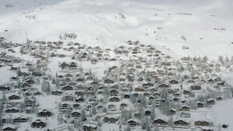 drone aerial of the beautiful resort and spa town verbier in the swiss alps