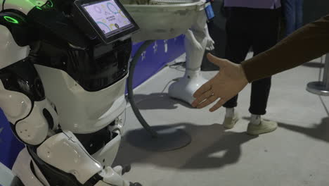 robot handshaking with a person