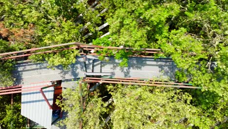 aerial shot of a scientific observational deck over a forest in puéchabon