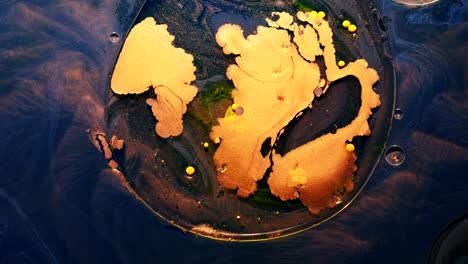 oil paint water mix planet earth blue yellow ink