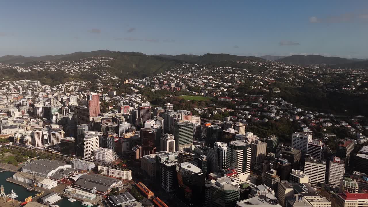 Famous port of Wellington in New Zealand st sunny day. City with houses and neighborhood on island. Aerial panoramic shot