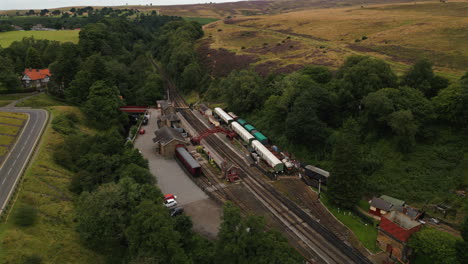 establishing drone shot over goathland train station