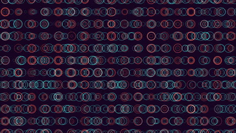 círculos simétricos rojos y azules en patrón circular sobre fondo oscuro