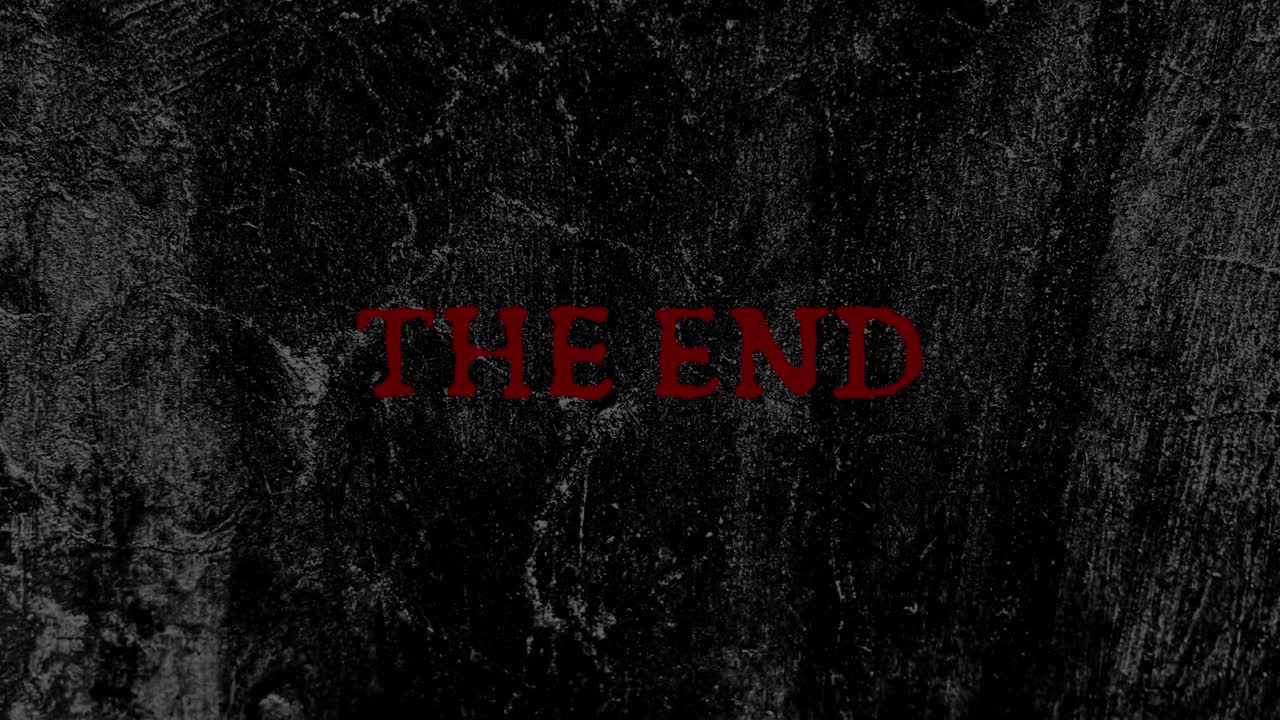 Red 'The End' Text on Dark Grungy Flickering Background