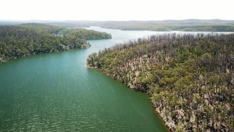 reverse aerial footage over the mallacoota inlet, in eastern victoria, australia, december 2020, a year after wildfires affected the region