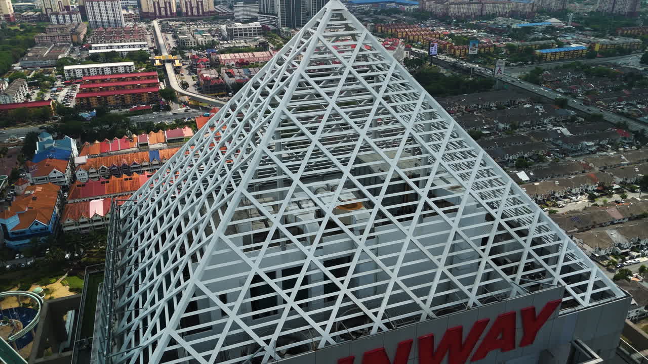 Aerial view rising around the roof of the Sunway tower in Kuala Lumpur, Malaysia