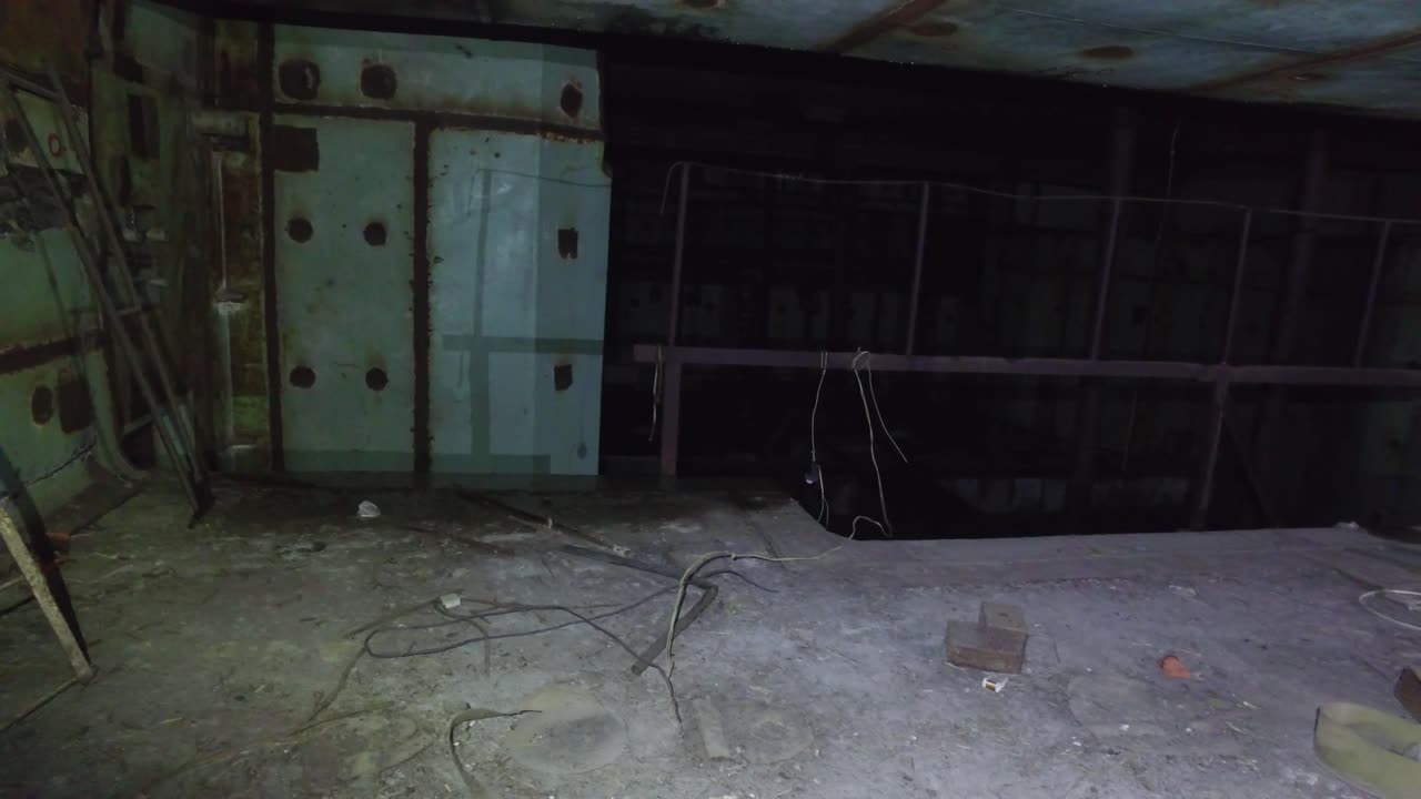 Interior Of Abandoned Building In Chernobyl Power Plant In Ukraine - Panning Shot