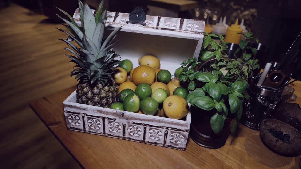 Fresh Fruit and Herbs in a Wooden Box
