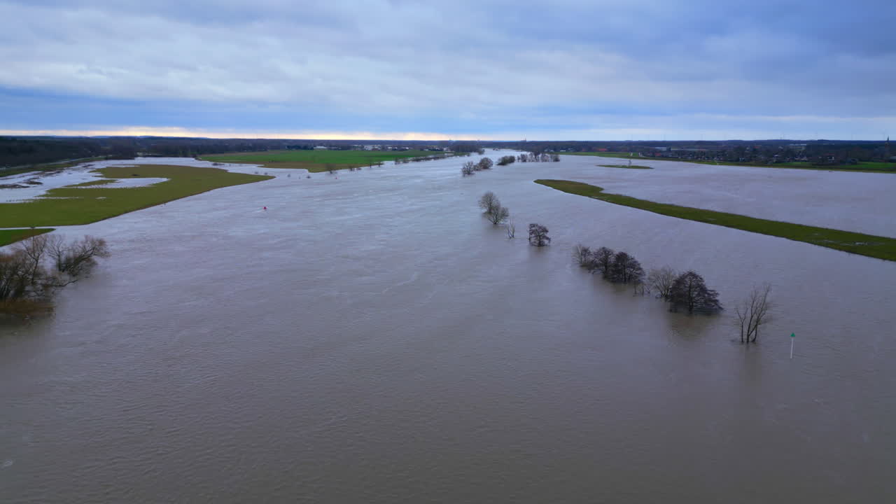 Panoramic view of flooded area next to flooded Maas river in Limburg Netherlands
