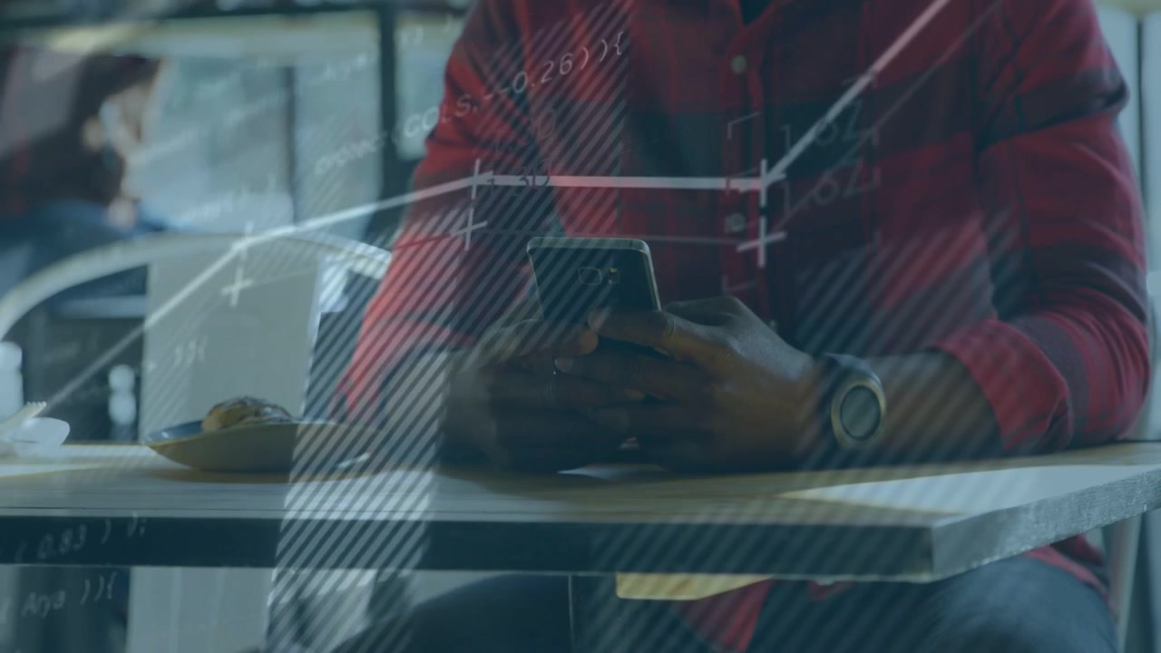 Adult male tapping smartphone and activating tech overlays with charts while analyzing data in cafe