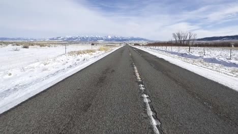 Camera-dolly's-above-road-in-the-middle-of-nowhere